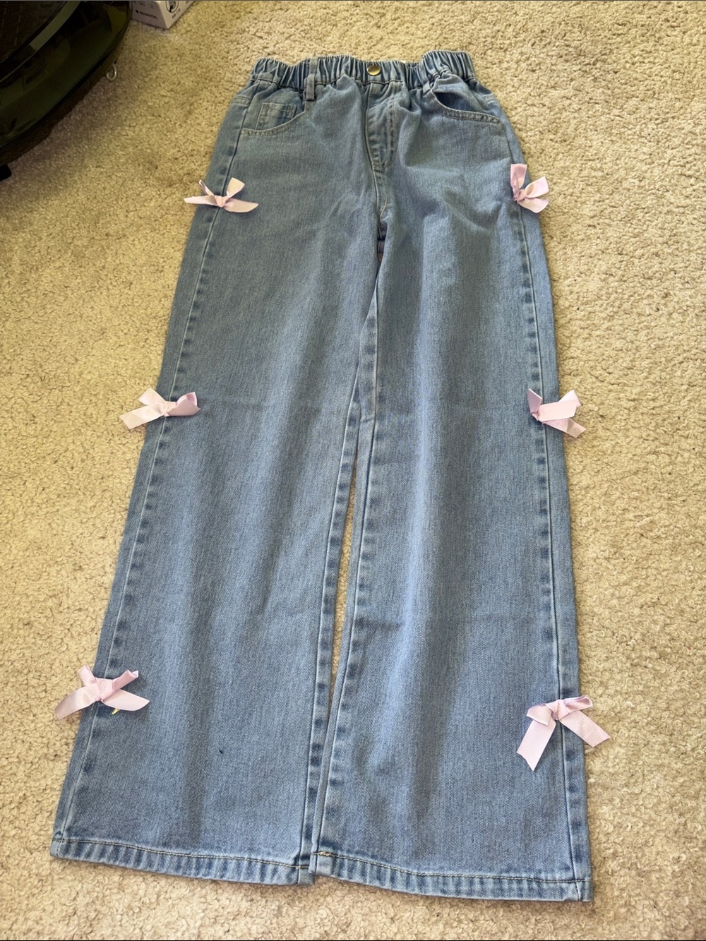 Light Blue Jeans with Pink Bow Accents